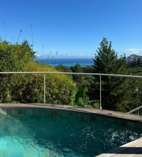 Studio Confort avec Piscine et Vue Tahiti Punaauia